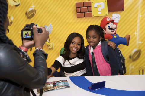 Photos of Olympic Gold Medalist Gabrielle Douglas Appearing at Nintendo World Store Today